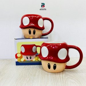 Taza de cerámica en forma de hongo rojo con puntos blancos inspirada en Super Mario Bros